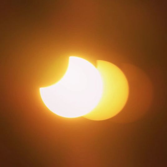 PHOTOS: Solar Eclipse Wows North China Residents