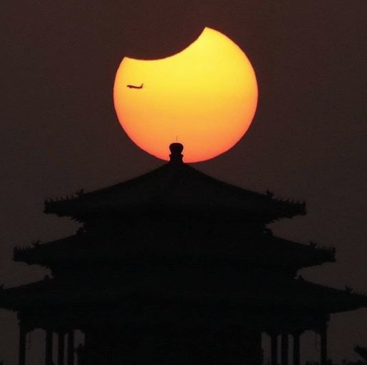 PHOTOS: Solar Eclipse Wows North China Residents