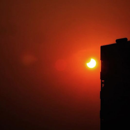 PHOTOS: Solar Eclipse Wows North China Residents