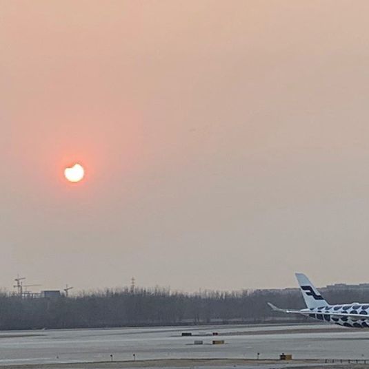 PHOTOS: Solar Eclipse Wows North China Residents